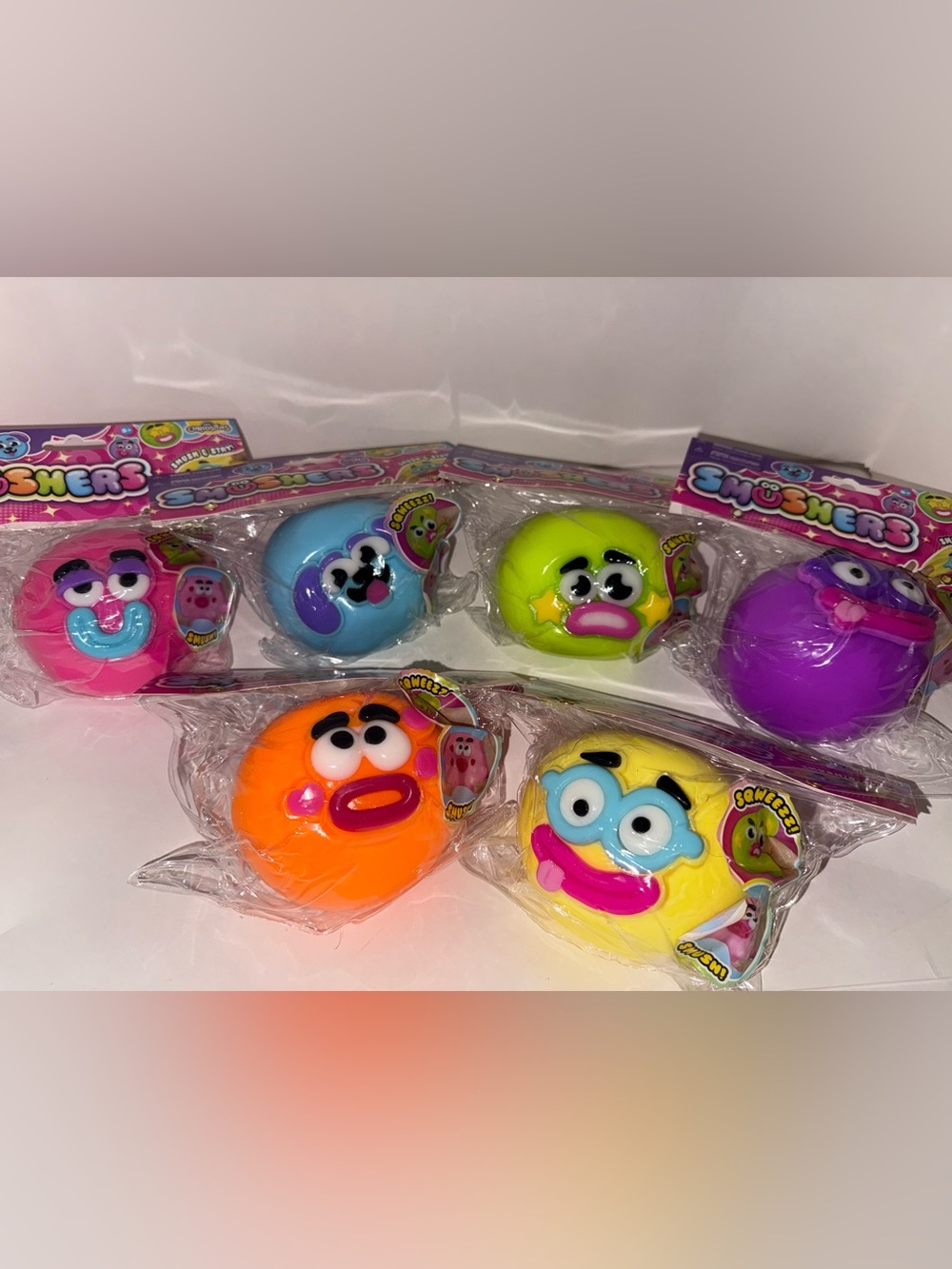 SmUsher Squeezable Face Balls - Pink, Blue, Yellow, Green, Orange, Purple